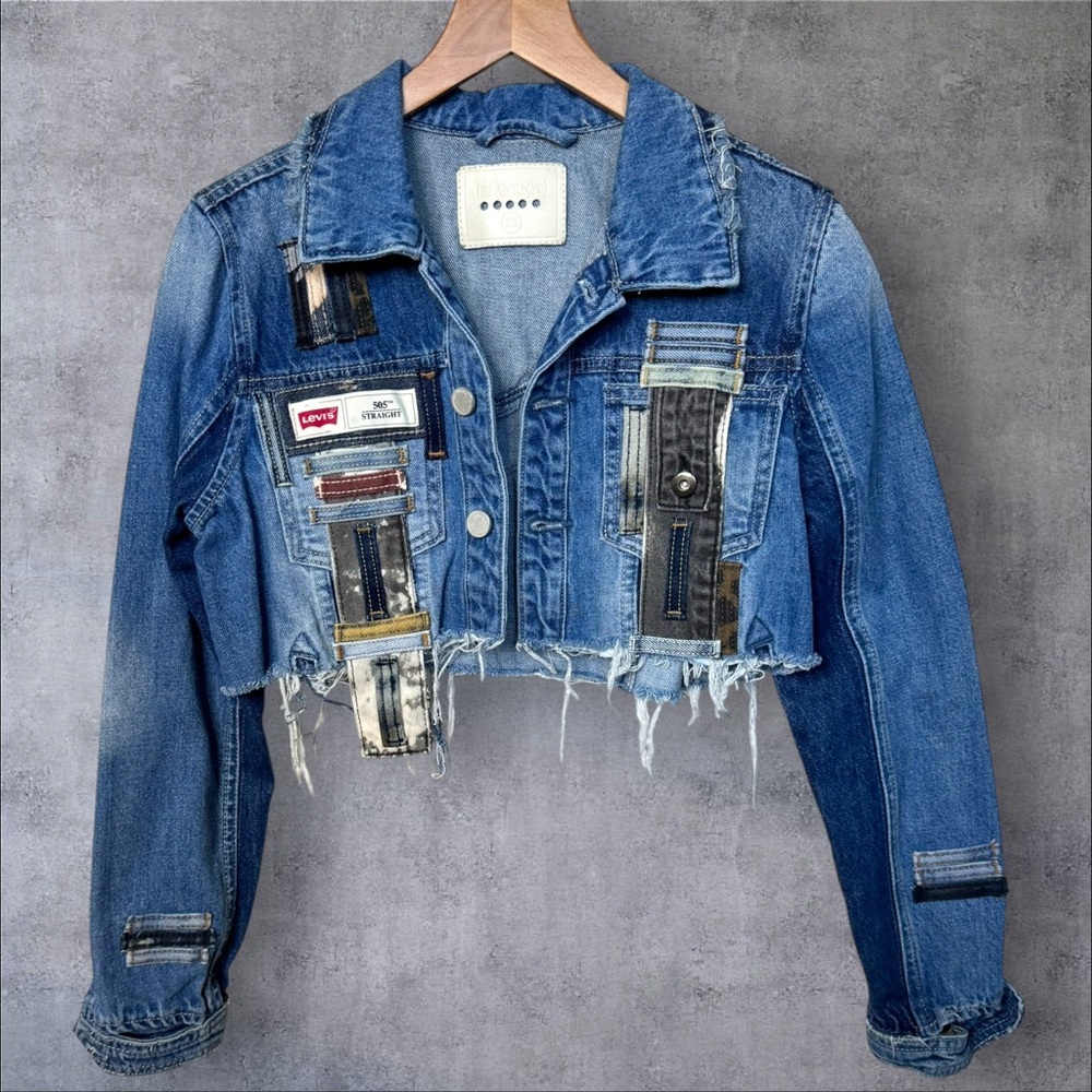 Levi's Blue Cropped Jean Jacket with Distressed Hem and Patches